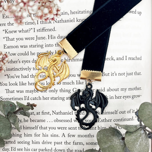 Black velvet ribbon bookmark with a golden and black dragon at either end